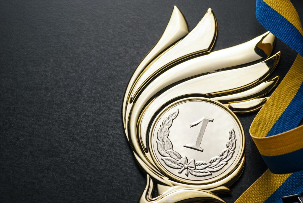 Champions Gold Trophy Medal Award 1024x686