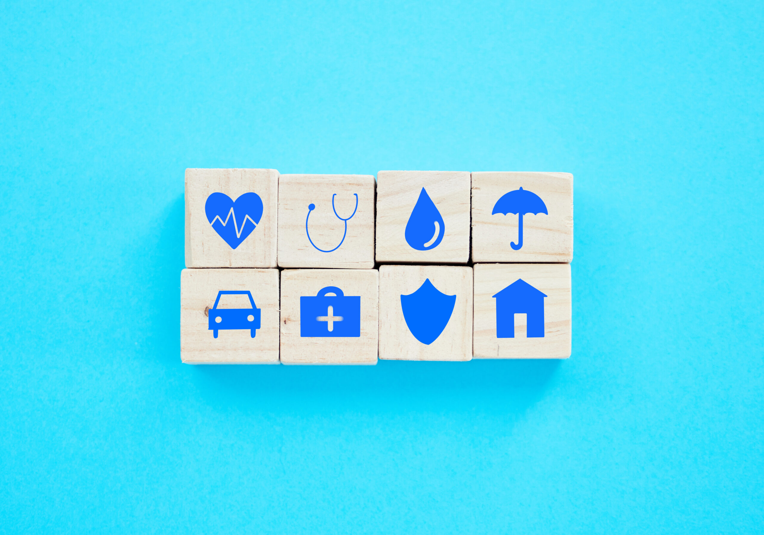 shot of wooden blocks with insurance related symbo 2026 01 09 10 54 28 utc.jpg
